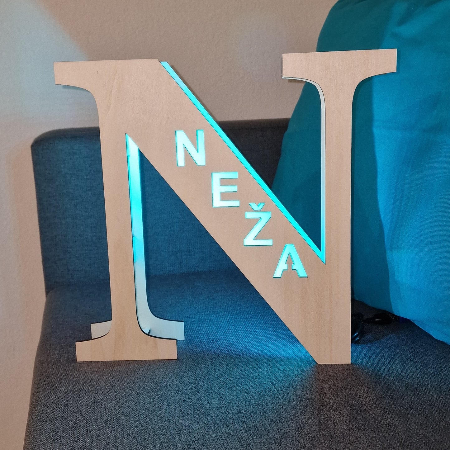 A wooden lamp with a name - Letter