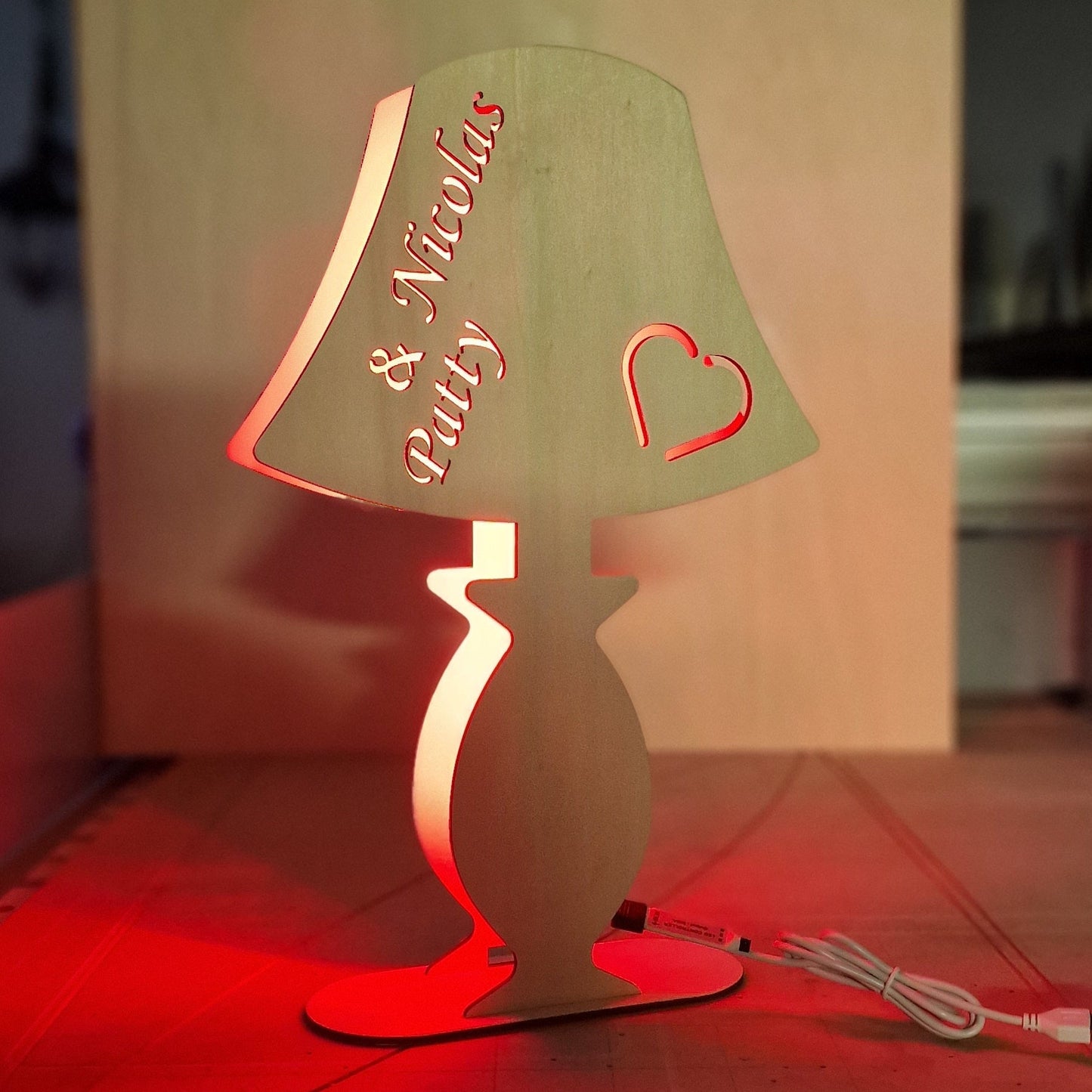 A wooden lamp with a name